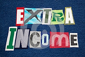 EXTRA INCOME text word colorful fabric collage on blue denim, side hustle