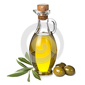 Extra olive oil bottle and green olives on white background