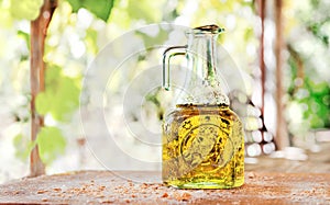 Extra vergin olive oil bottle on the morning sun