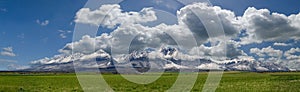 Extra wide panorama of High Tatra mountains with snowy hills Vysoke Tatry Slovakia, golden hours