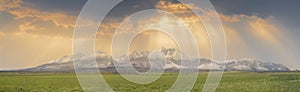 Extra wide panorama of High Tatra mountains with snowy hills Vysoke Tatry Slovakia, golden hours