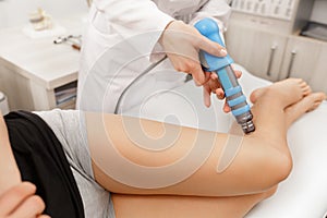 Extracorporeal Shockwave Therapy ESWT. Effective non-surgical treatment.Physical therapy of hamsting with shock waves