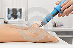 Extracorporeal Shockwave Therapy ESWT.Effective non-surgical treatment.Physical therapy for plantarfascitis with shock