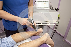 Extracorporeal Shockwave Therapy ESWT.Effective non-surgical treatment.Physical therapy for plantarfascitis with shock waves.Pain