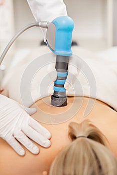 Extracorporeal Shockwave Therapy ESWT.Non-surgical treatment.Physical therapy for neck and back muscles,spine with shock