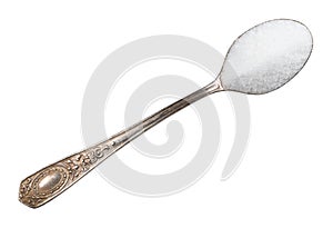 Extract of stevia plant in silver teaspoon cutout