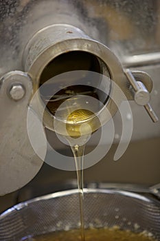 Extracting honey from the honeycomb