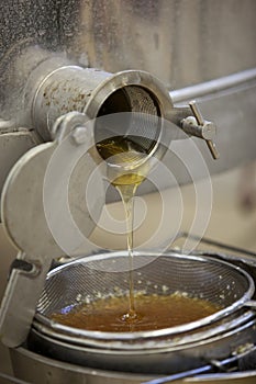 Extracting honey from the honeycomb