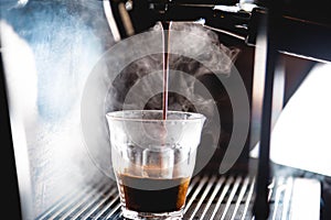 Extraction of an espresso with bright light