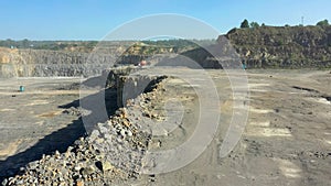 Extraction of granite. Open cast mine. Stone Quarrying. Granite quarry.