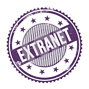 EXTRANET text written on purple indigo grungy round stamp