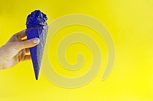 Extraordinary colored ice cream against sunny yellow background