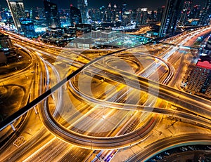 Extraordinary thoroughfare leading to Abu Dhabi near biggest skyscrapers. Dubai, United Arab Emirates.