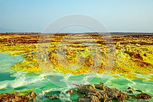Extraterrestrial landscape with toxic lakes and sulphur minerals, Danakil Depression desert, Afar region, Ethiopia photo