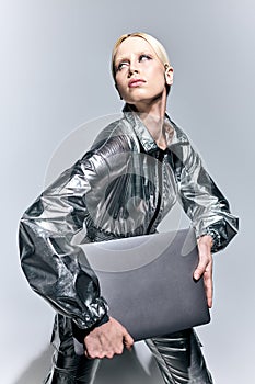 extravagant appealing woman in silver robotic