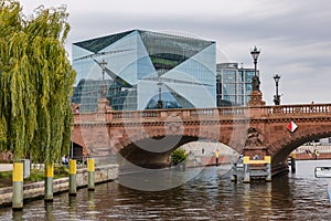 Extravagant big cube on the bank of the Spree River near the Moltke Bridge in Berlin, Germany