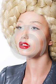 Extravagant Hairstyle. Stylish Woman with Creative Art Trendy Wig