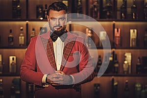 Extravagant stylish man in gentleman club photo