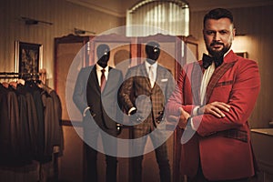 Extravagant stylish man in tailor studio
