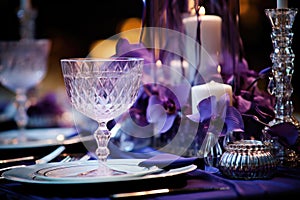 extravagant wedding place setting with crystal dinnerware