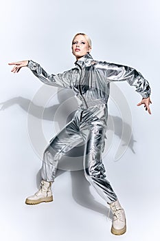 extravagant woman in silver futuristic attire