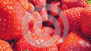 extreme close-up of a bunch of ripe strawberries, detailed