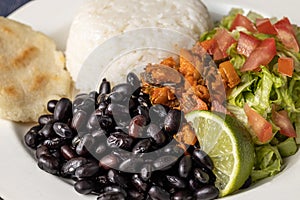 Extreme close up of Casado, typical Costa Rican dish with rice, beans and vegetables