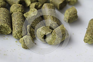 Extreme close up of compressed Hop pellets