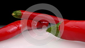 extreme close-up. detailed. hot red pepper on a dark background