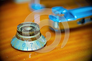 Close up of an electric guitar volume knob