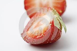 An extreme close-up of a fresh strawberry.