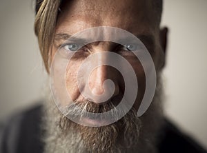 Extreme close up portrait of an attractive bearded man