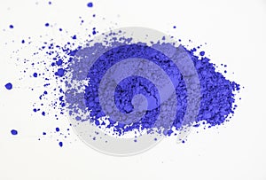 Ultramarine pigment isolated over white photo