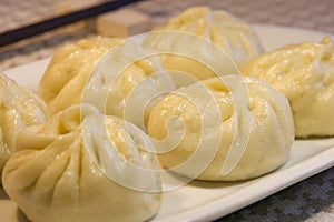 Extreme closeup of Chinese steamed meat buns, homemade gourmet food