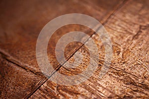 Extreme closeup of crumpled brass foil texture