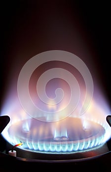 Extreme closeup of gas flame on hob