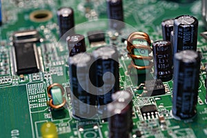 Extreme detail on the electronic components of a modern pc motherboard.