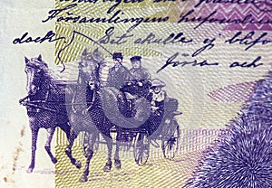 Extreme details of 20 Swedish Krona banknote, carriage, horses