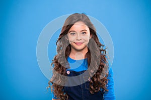 Extreme hair volume. Kid girl long healthy shiny hair. Little girl grow long hair. Teaching healthy hair care habits