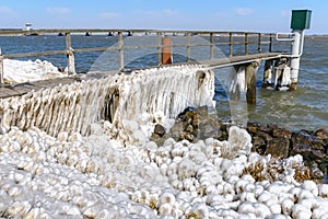 Extreme Ice Storm at the coats of a dutch lake, Netherlands