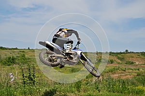 Extreme jump motocross racer by motorcycle