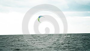 Extreme kite boarding in real time. Summer fun action sports.