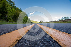 Extreme Low Angle of Yellow Road Stripe