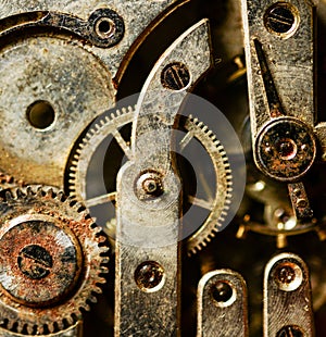 Extreme macro shot of vintage rusted clock mechanism