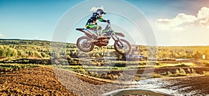 Extreme Motocross MX Rider riding on dirt track