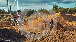 Extreme Motocross MX Rider riding on dirt track