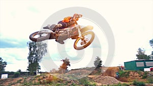 Extreme Motocross MX Rider riding on dirt track