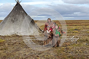 The extreme north, Yamal, the past of Nenets people, the dwelling of the peoples of the north, a family photo near the yurt in the