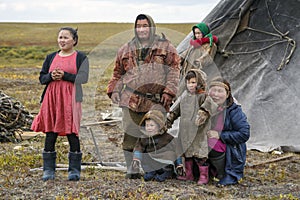 The extreme north, Yamal, the past of Nenets people, the dwelling of the peoples of the north, a family photo near the yurt in the