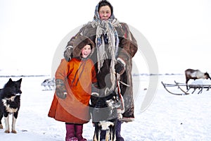 The extreme north, Yamal, the past of Nenets people, the dwelling of the peoples of the north, a family photo near the yurt in the